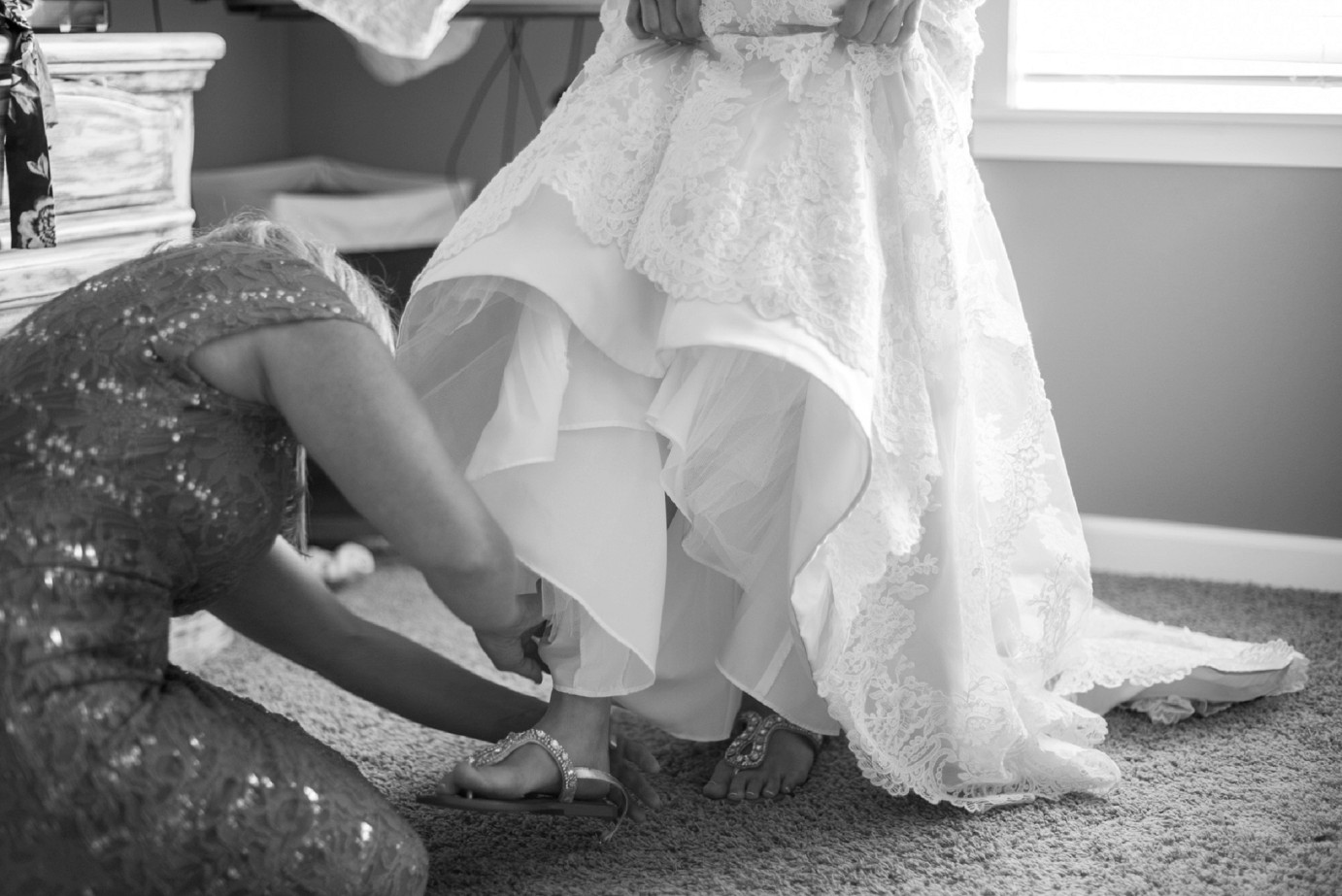 Kennewick wedding bride's mom putting her shoes on photo