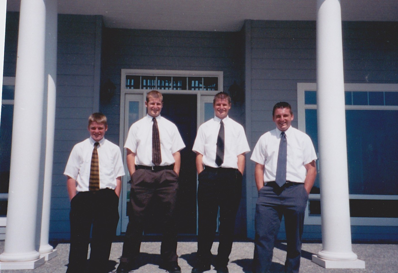 Wenatchee Photographer Boys in ties in front of house photo