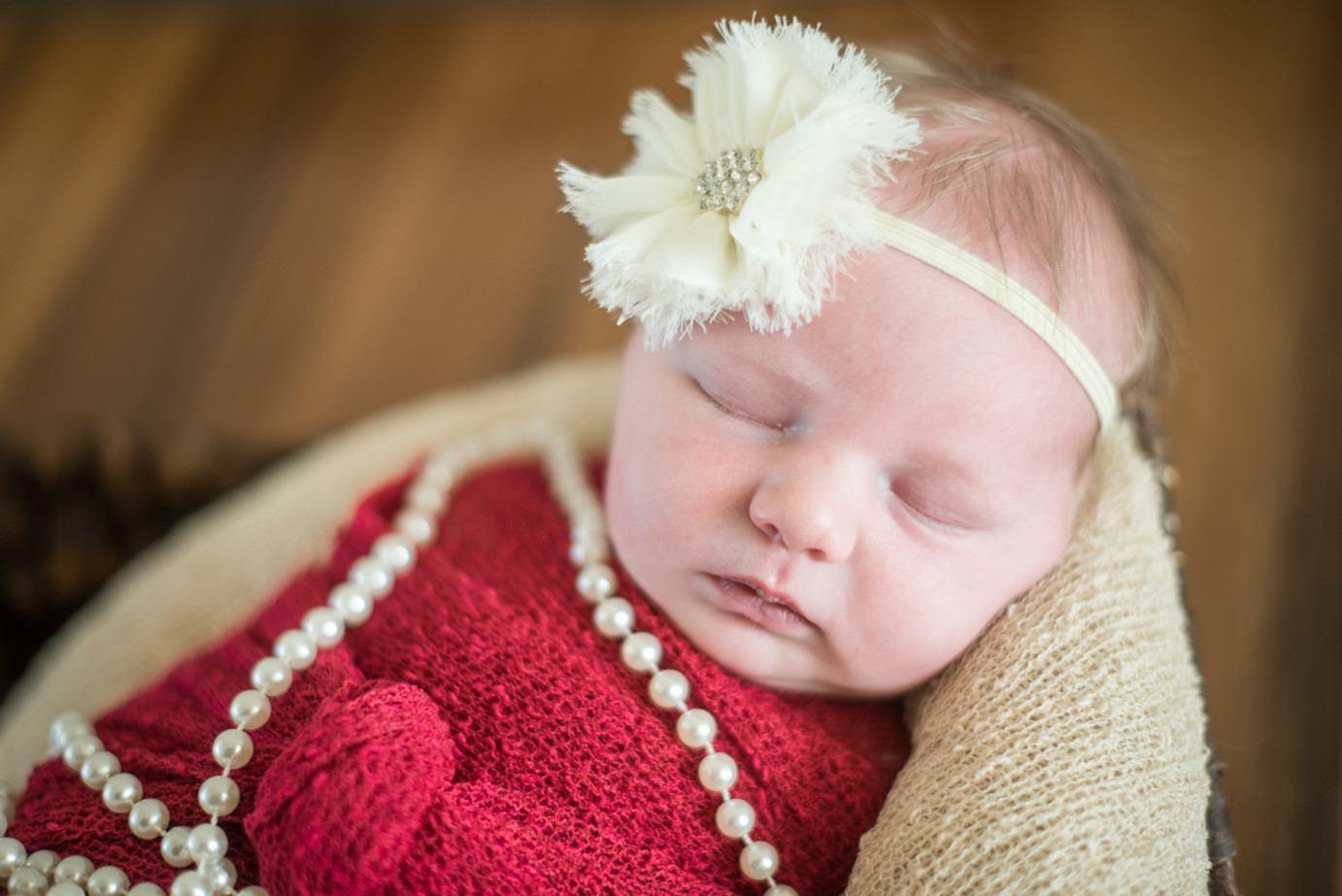 Newborn Photographer Trios Hosptial Kennewick WA Baby girl laying in basket photo