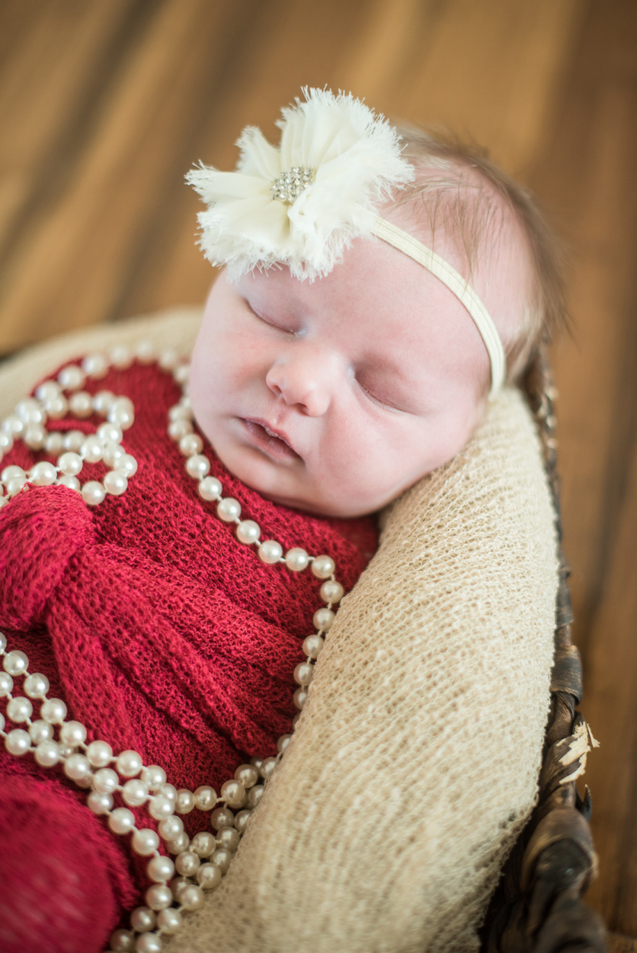 Newborn Photographer Trios Hosptial Kennewick WA Baby girl with beige headband photo
