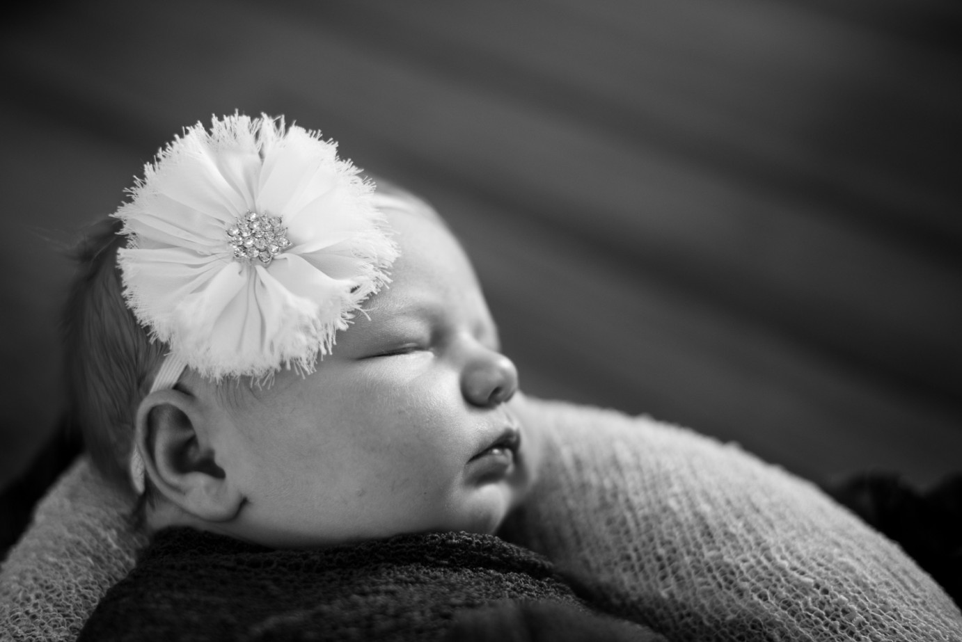 Newborn Photographer Trios Hosptial Kennewick WA Baby girl with beige headband with flower photo