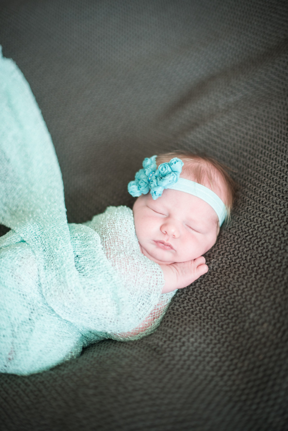 Newborn Photographer Trios Hosptial Kennewick WA Baby girl with aqua bow photo
