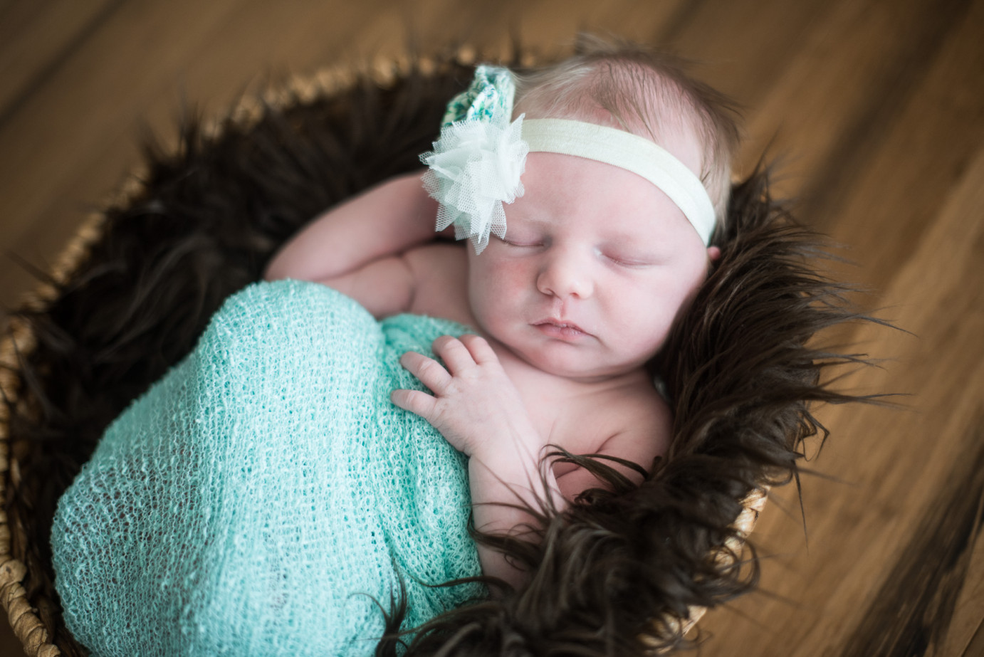 Newborn Photographer Trios Hosptial Kennewick WA Baby girl in brown basket photo