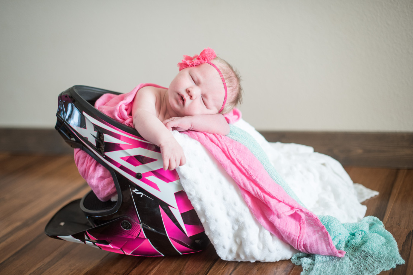 Newborn Photographer Trios Hosptial Kennewick WA Baby girl in pink helmet photo