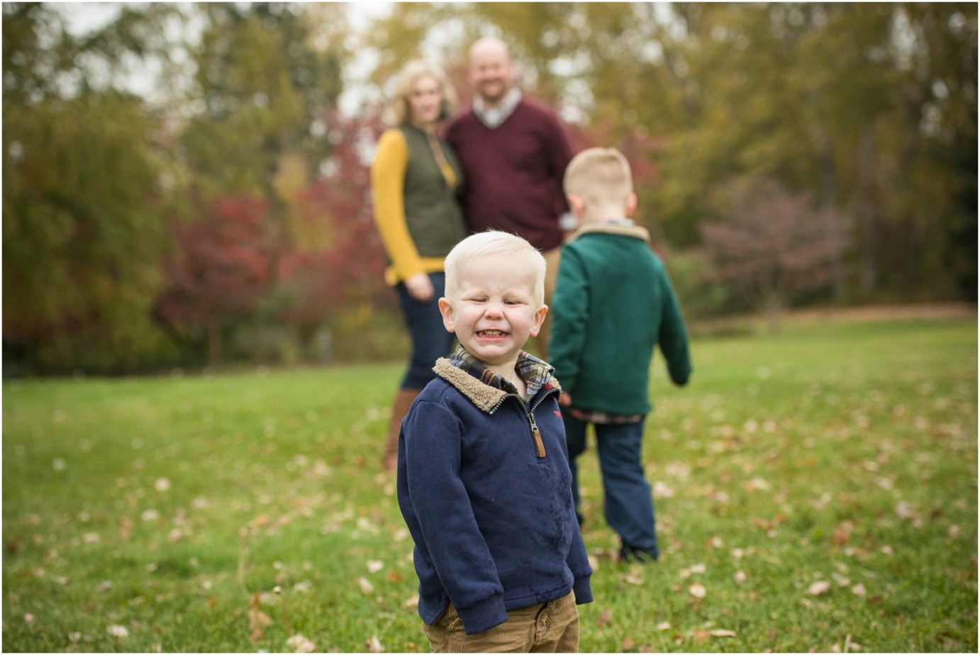 Yakima Area Arboretum Family Photographer little boy smiling in front of parents Photo