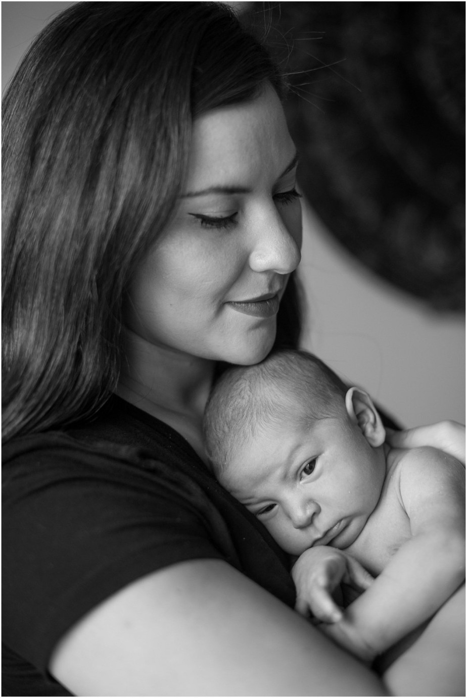 Othello WA Newborn Photographer new mom holding newborn boy photo