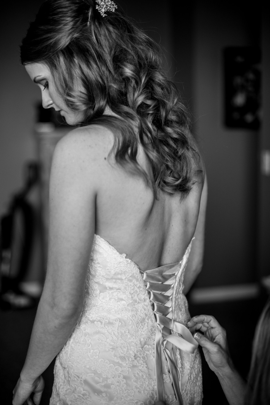 Wedding Day planning and tips bridal prep bride getting into wedding dress photo