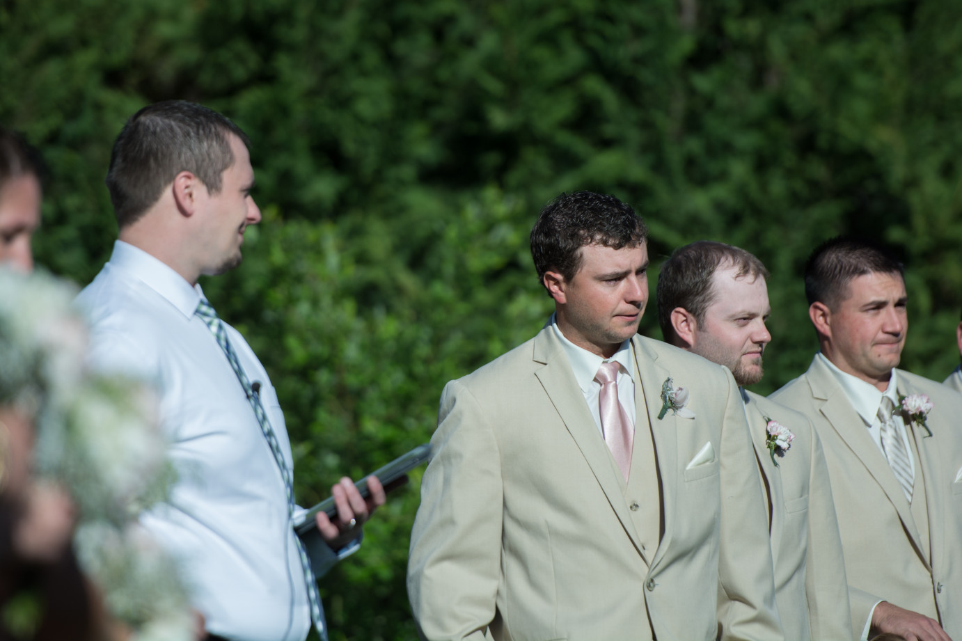 Why choose a First Look Wenatchee Photographer Groom crying during ceremony first look photo