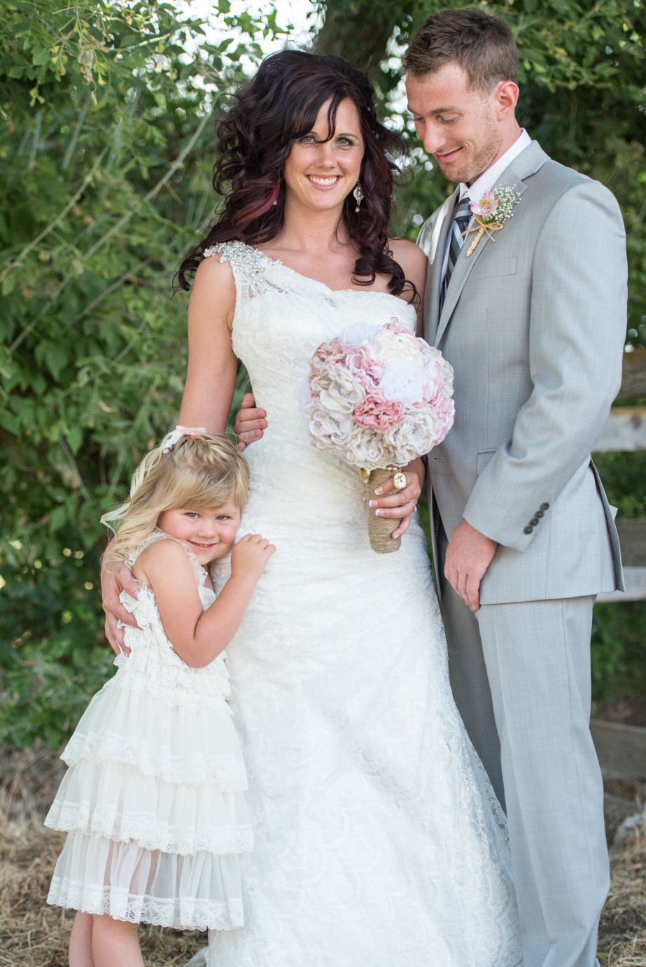 Favorite 2015 Wedding Moments Ellensburg Fairground Wedding Bride and groom formal with daughter photo