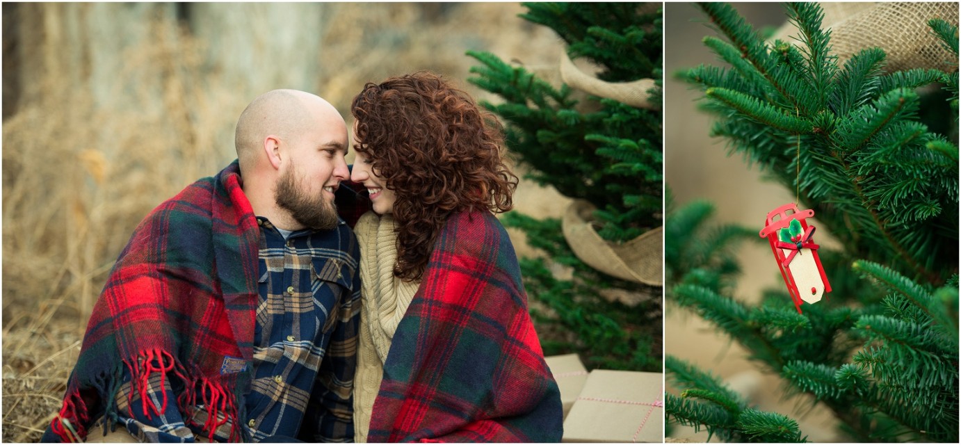 Kennewick Christmas Inspired Couple Shoot couple snuggling in front of Christmas Tree and ornament photo
