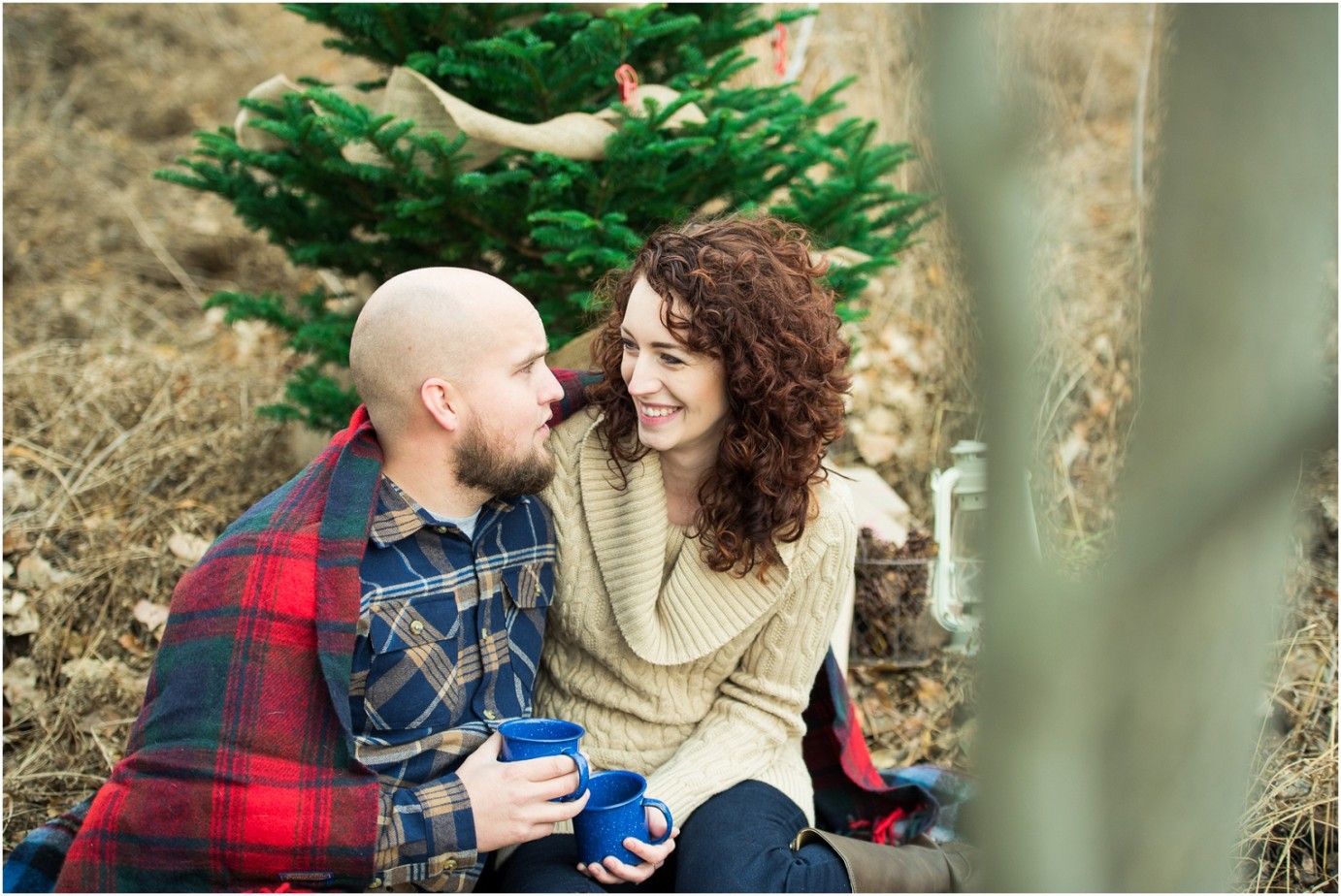 Kennewick Christmas Inspired Couple Shoot couple drinking hot cocoa and lauging photo