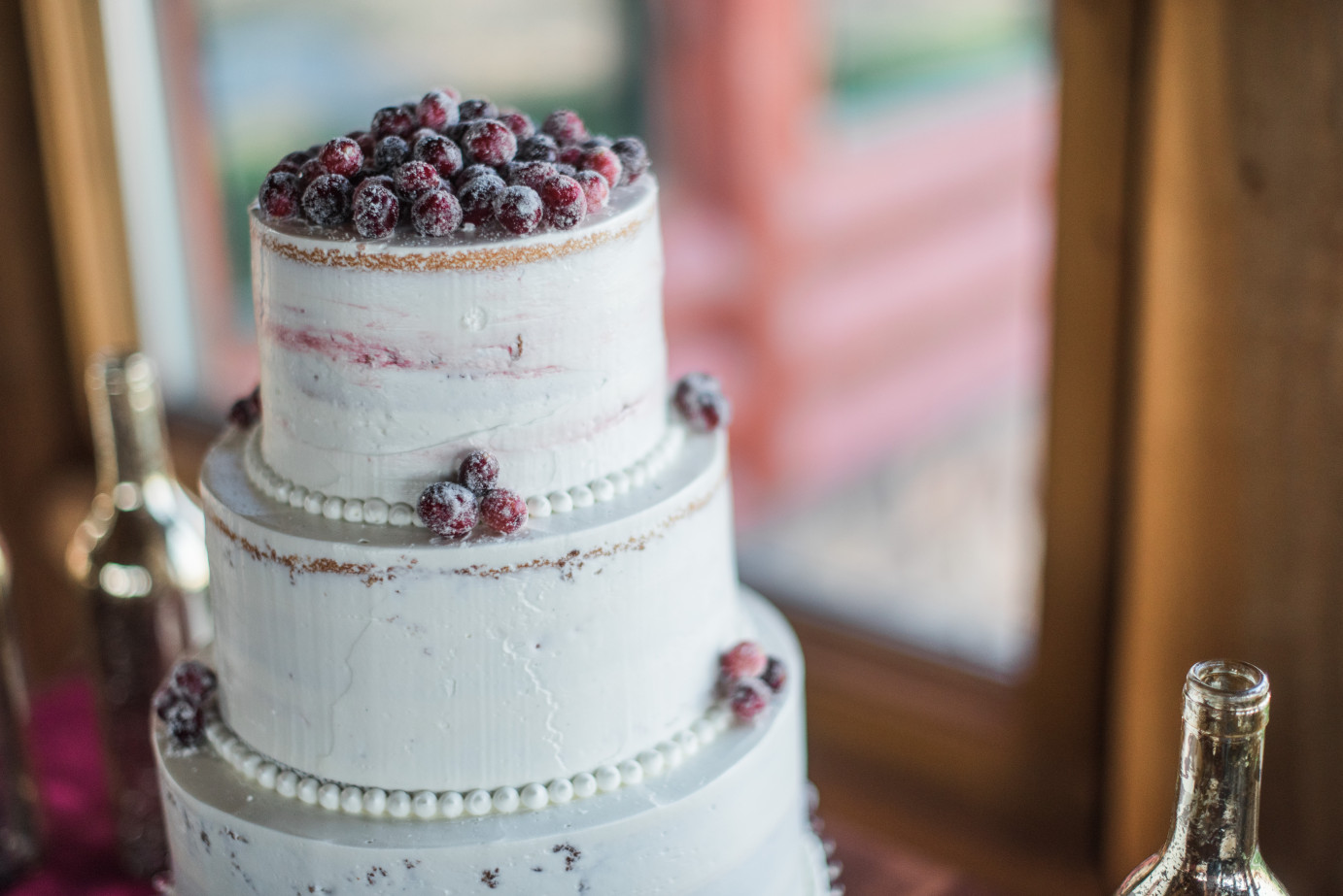 How to plan a styled shoot Naked wedding cake with sugared cranberries
