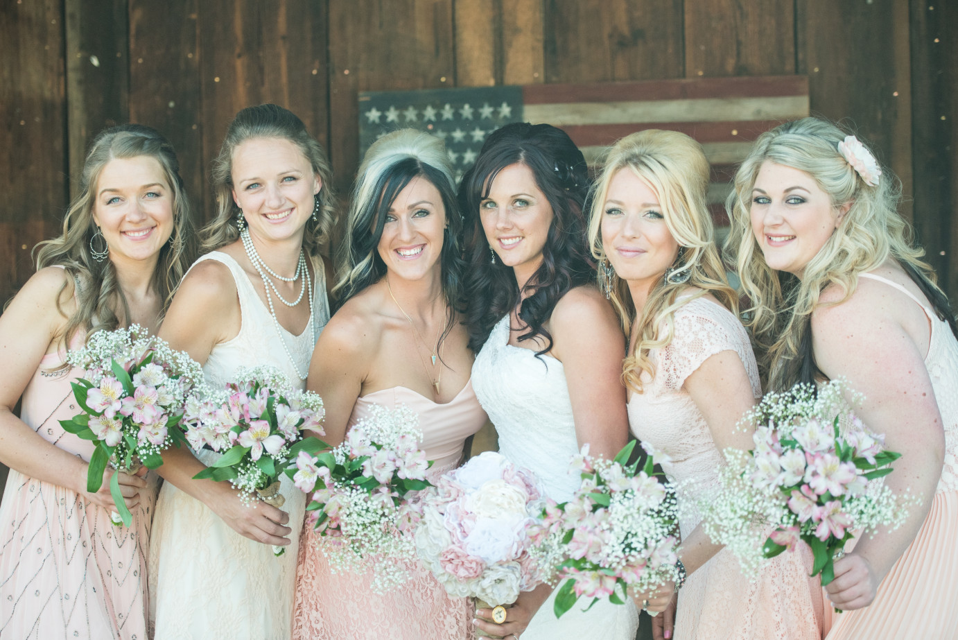 10 Ways to Keep Your Bridesmaids Happy Bridesmaids in Blush knee length dresses