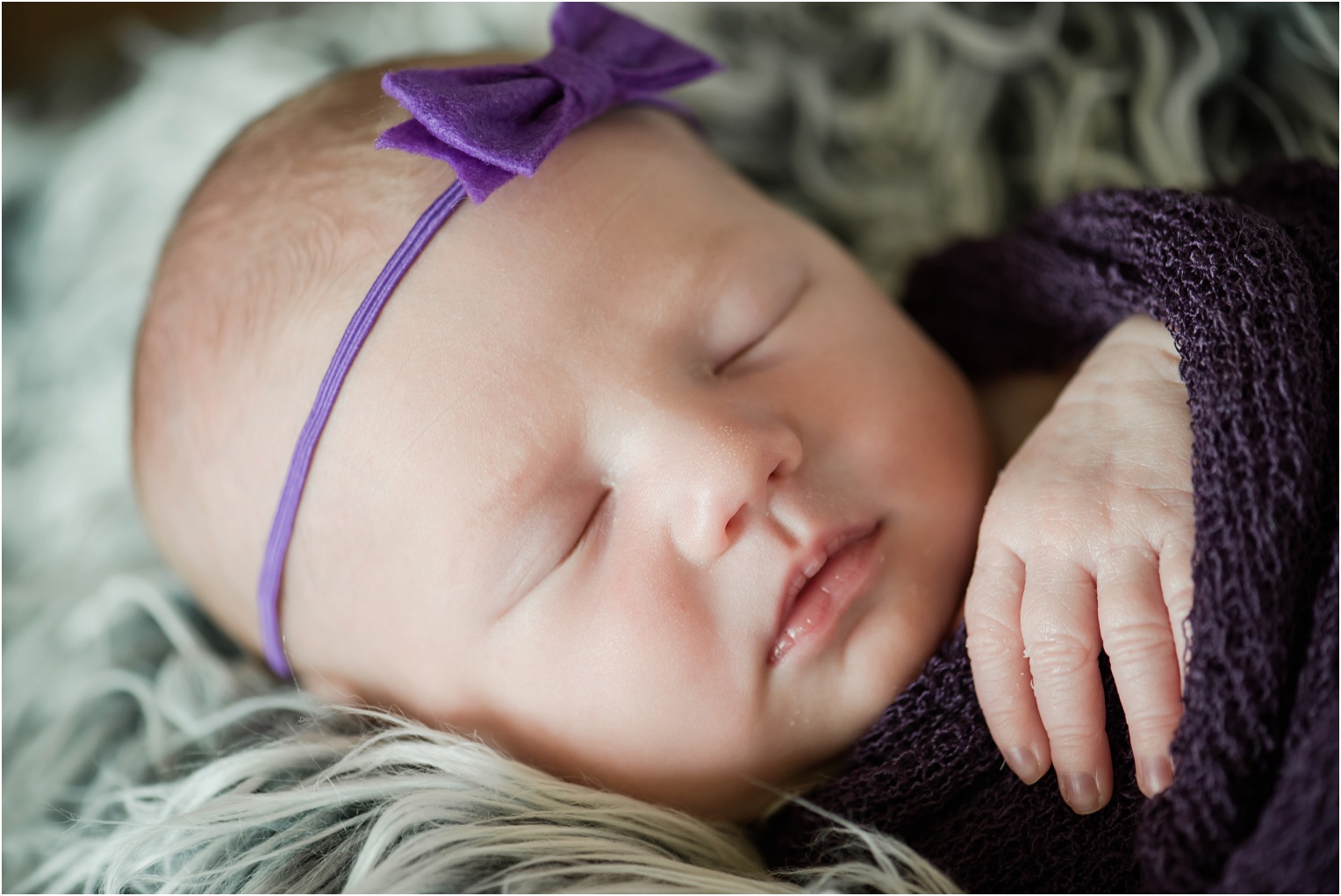 Janes Newborn Photography baby girl on fur rug