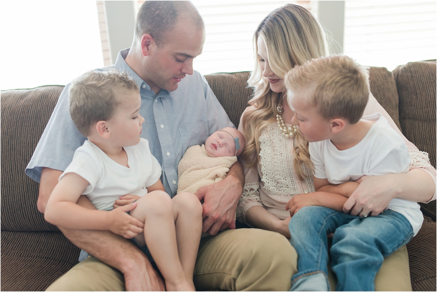 Janes Newborn Photography family with newborn girl lifestyle photo
