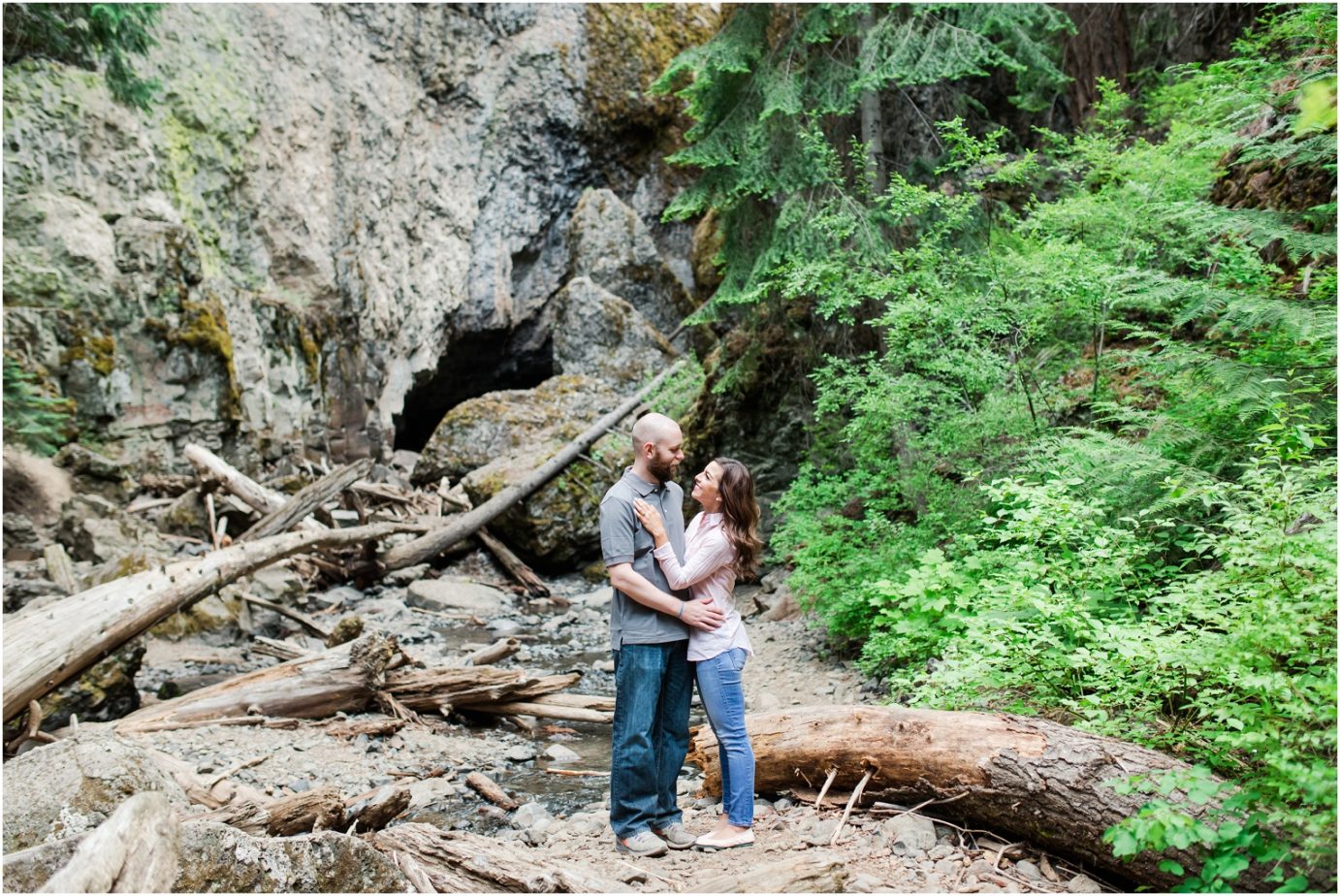 Boulder Cave Engagement Session Naches WA Couple in front of waterfall