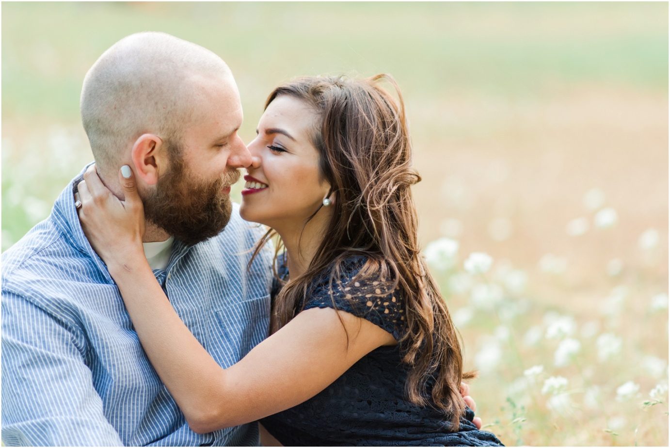 Boulder Cave Engagement Session Naches WA Couple snuggling in the grass