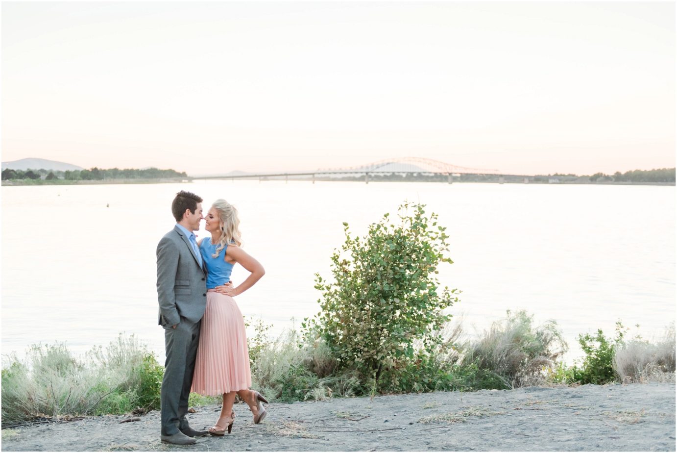 Clover Island Anniversary Session Kennewick WA Couple in front of the Blue bridge