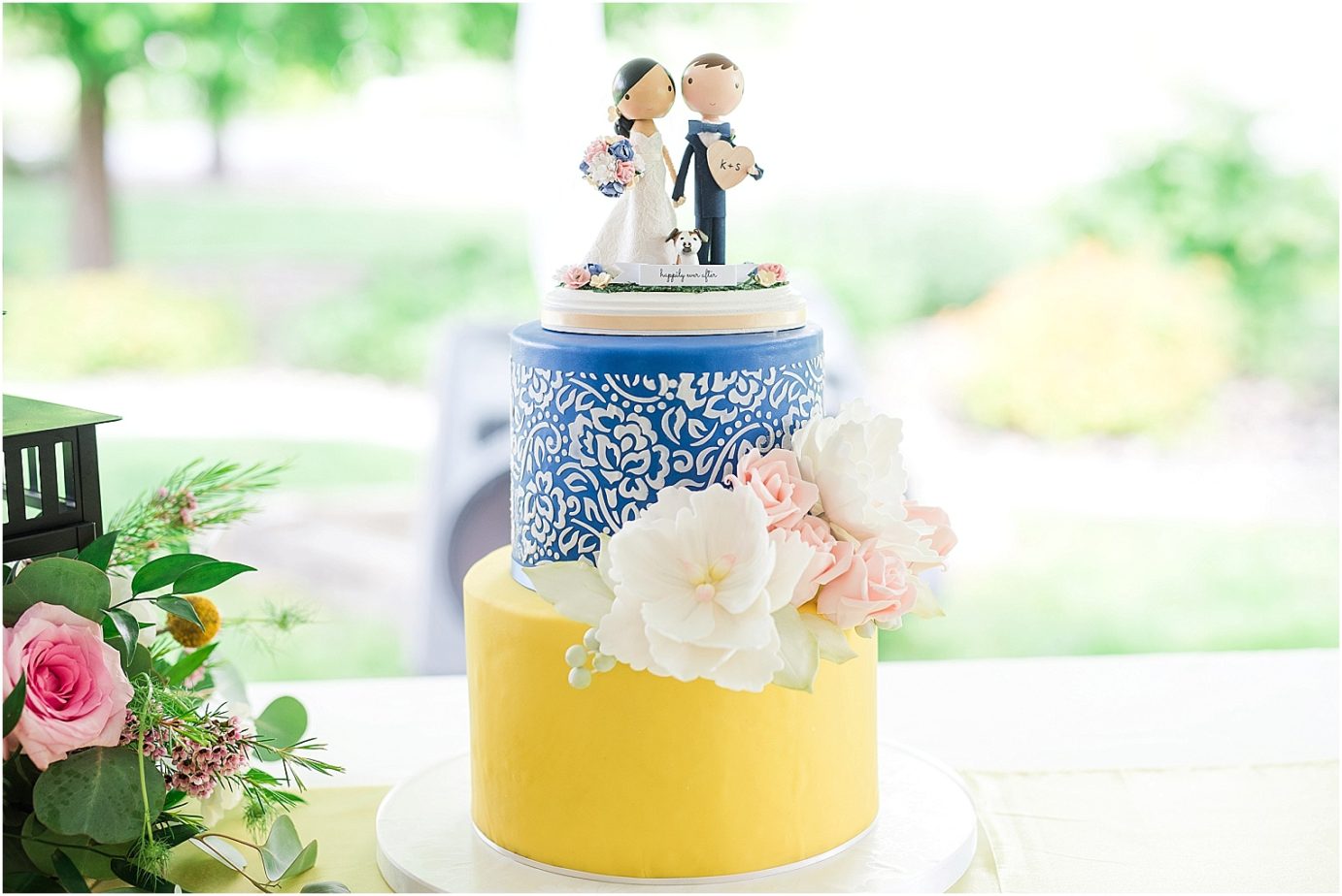 Promise Garden Wedding Pasco Photographer Blue and yellow cake with cute topper
