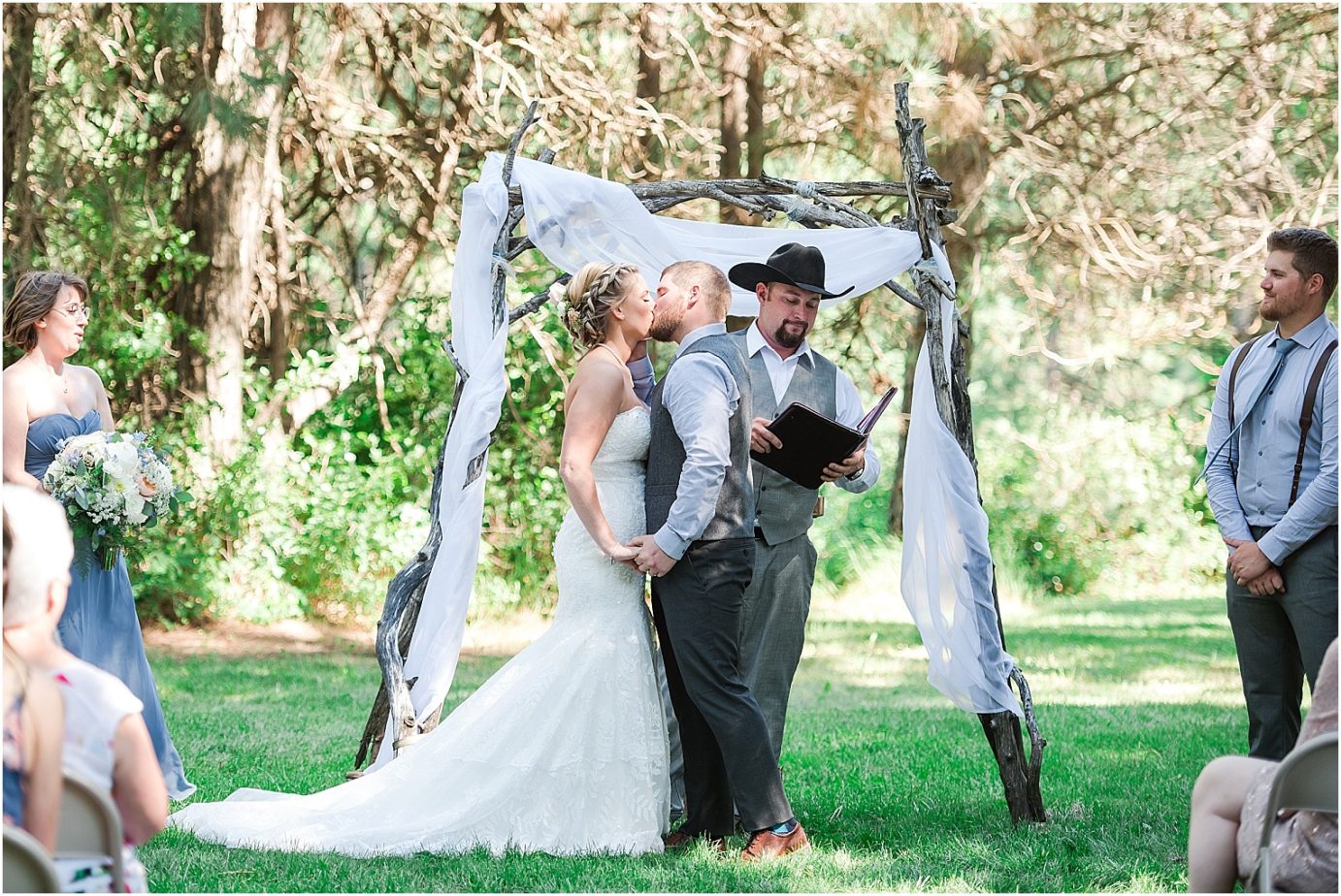 Elk Haven Equestrian Center Wedding Cle Elum Photographer Adam and Jessica bride and groom first kiss