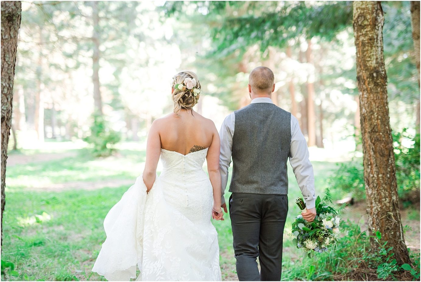 Elk Haven Equestrian Center Wedding Cle Elum Photographer Adam and Jessica bride and groom walking to reception