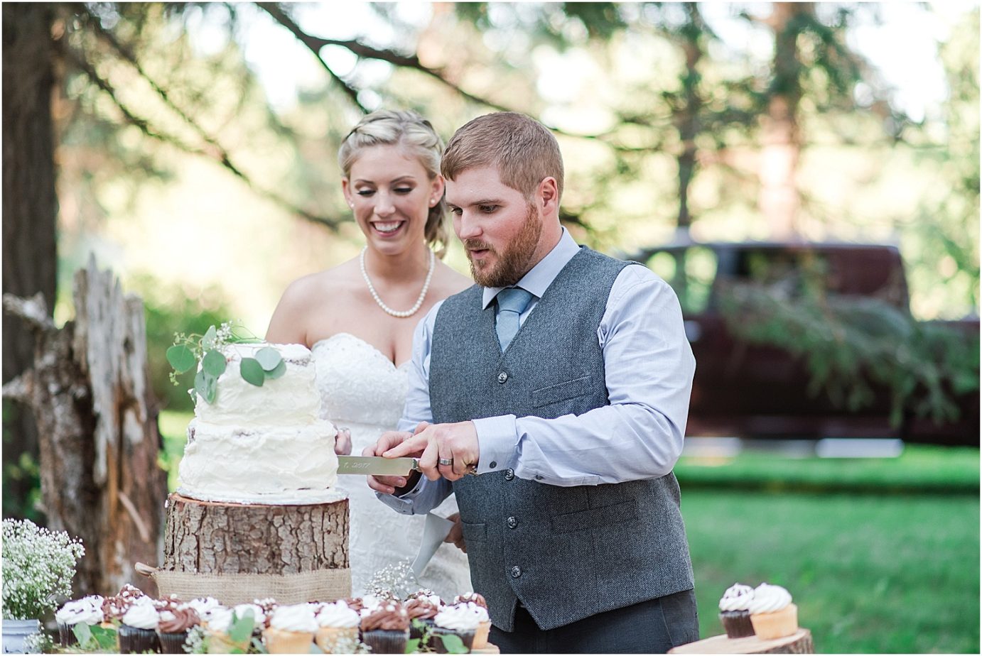 Elk Haven Equestrian Center Wedding Cle Elum Photographer Adam and Jessica cake cutting