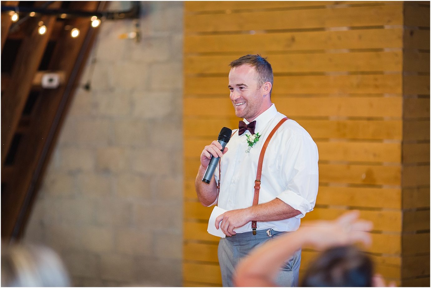 Pine River Ranch Wedding Leavenworth WA Matt and Kelsey toasts during reception