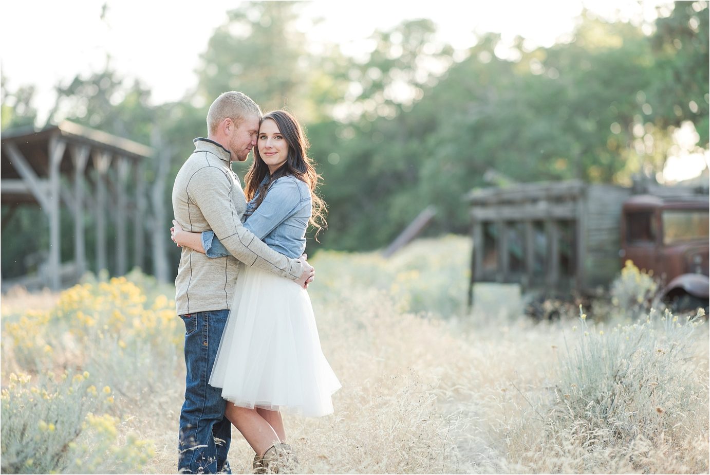Klickitat County Engagement Session Roosevelt WA Ethan and Makaela couple snuggling in the country