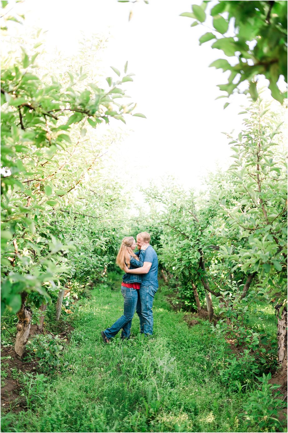 Desert engagement session Desert aire Photographer Ryan and Liz in apple orchard