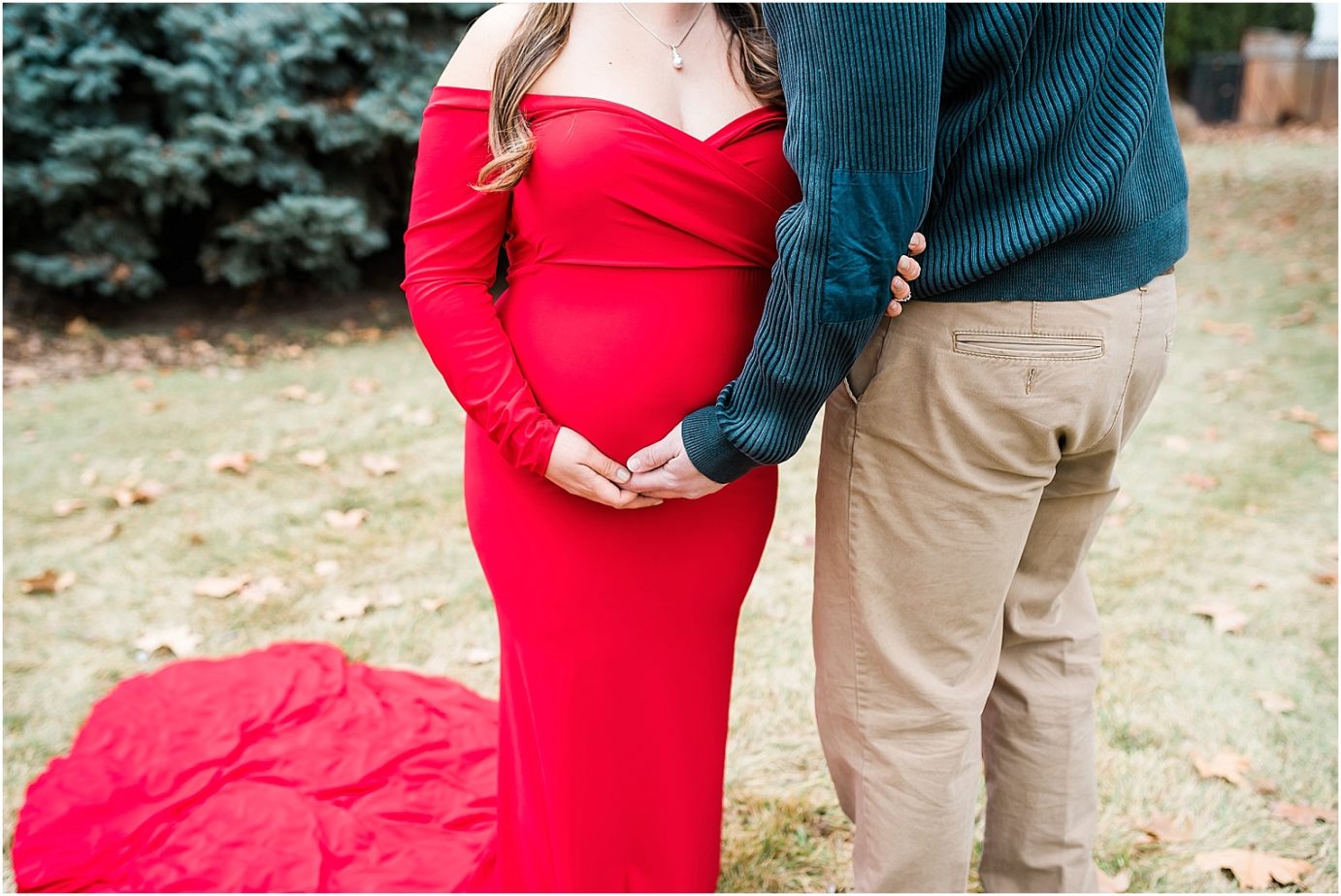 Maries maternity session prenant woman in long red dress with husband