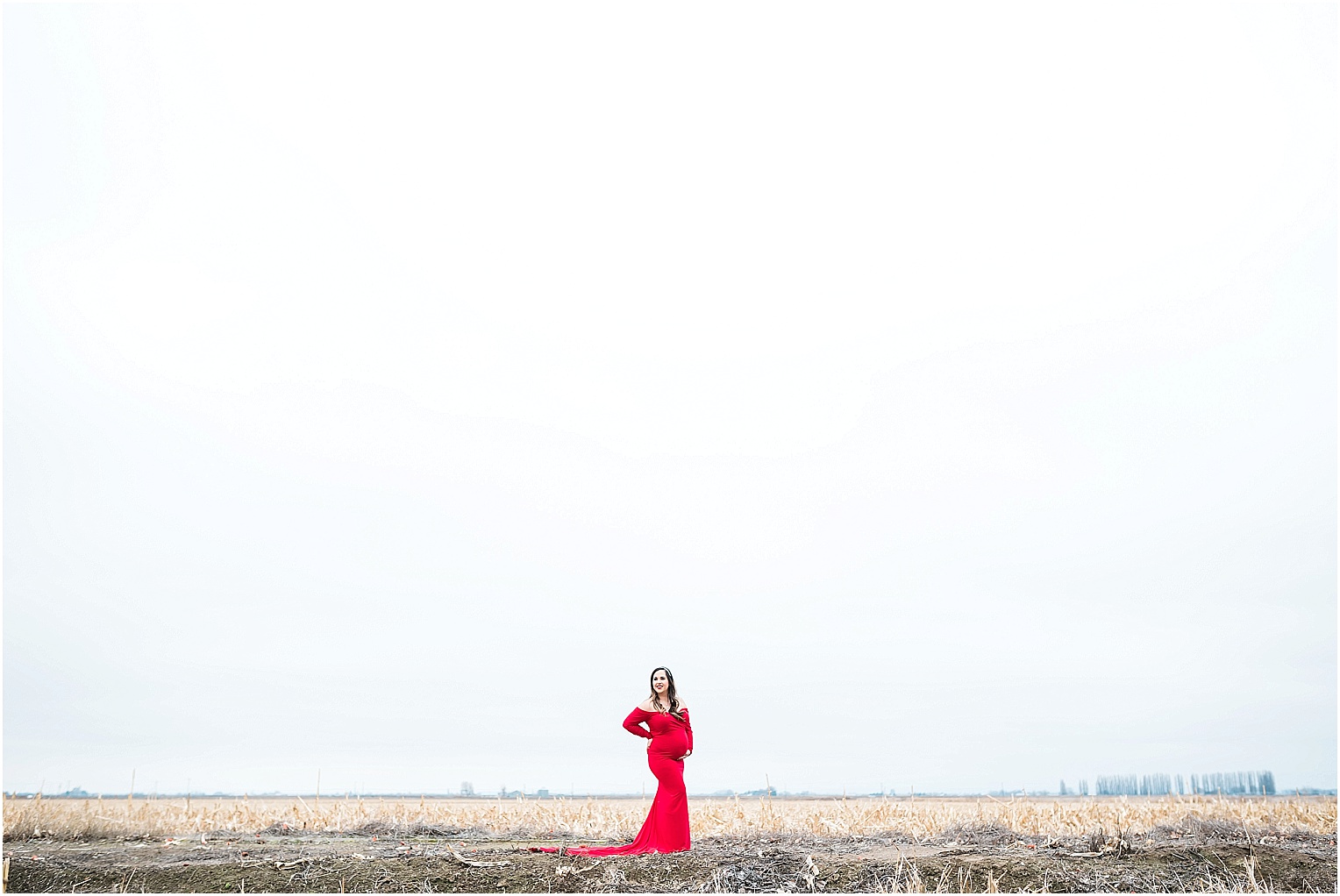 Maries maternity session prenant woman in long red dress