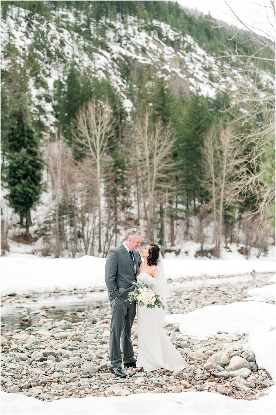 Intimate Methow Valley Elopement groom and bride on river bed