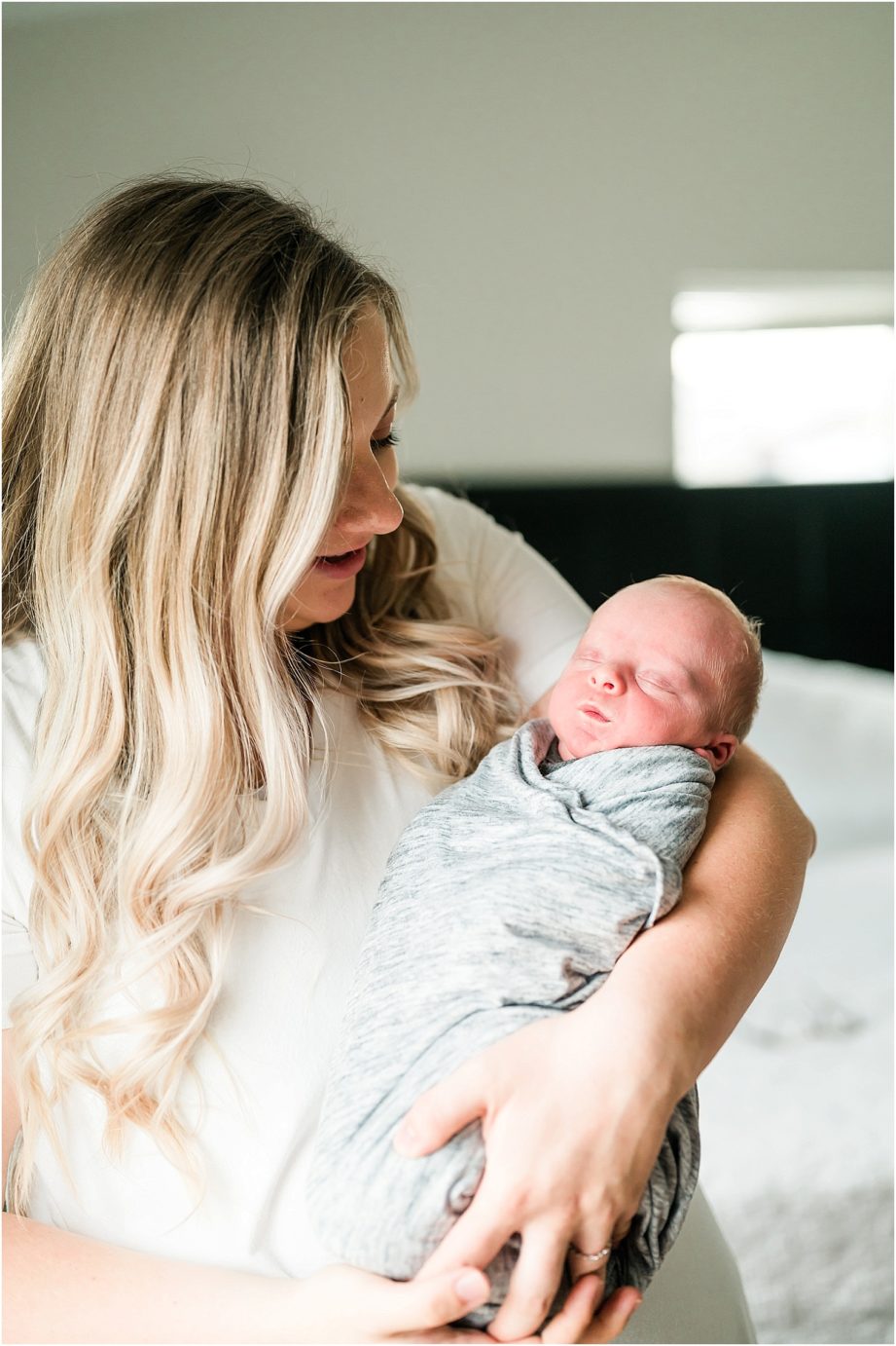 lifestyle newborn session mom with baby boy