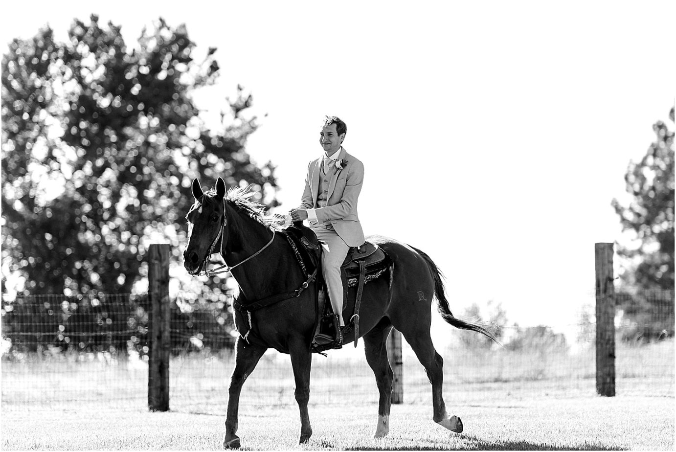 Prosser Farm Wedding Yakima Photographer Jake and Bri groom riding in on a horse