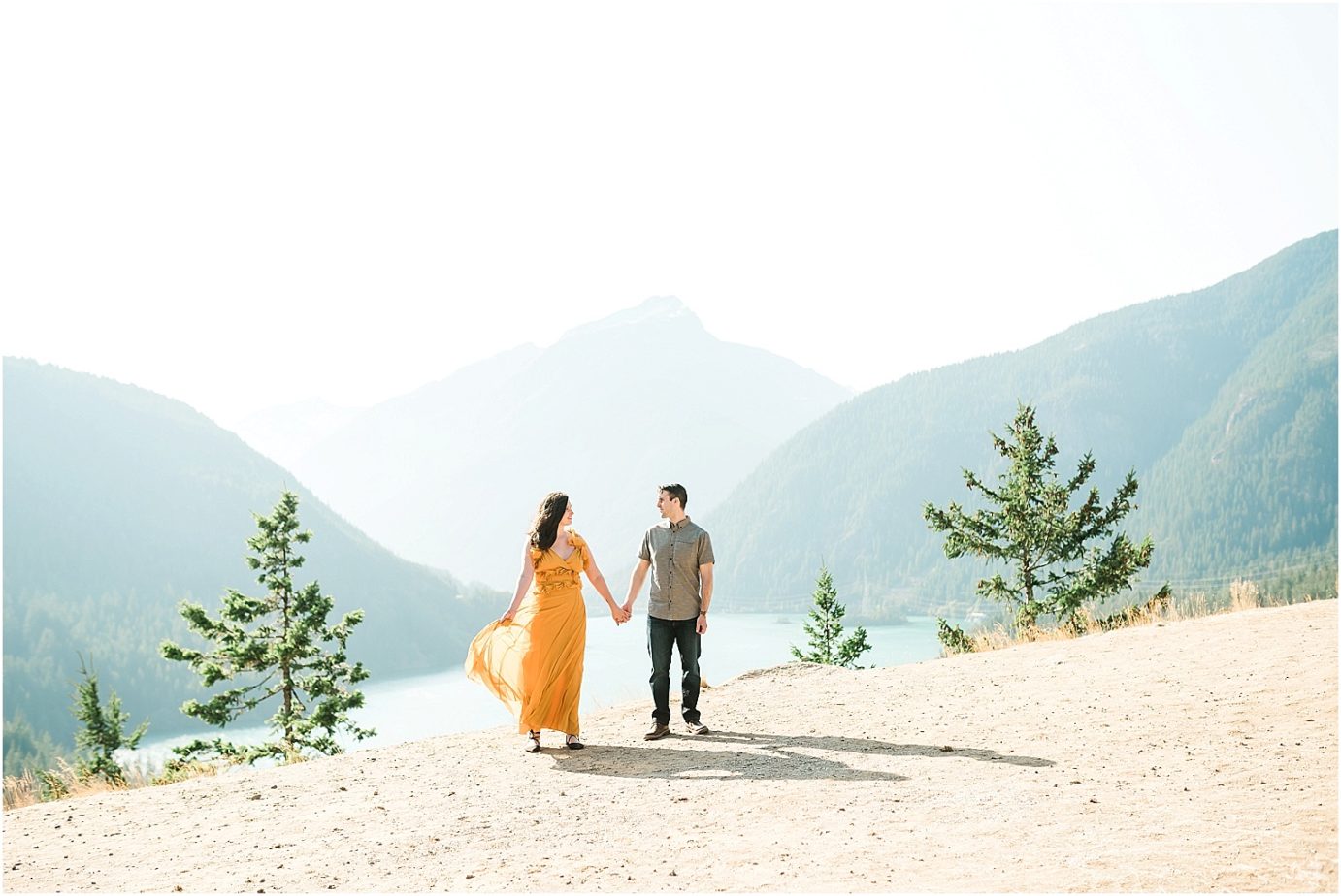 Diablo Lake Engagement Session Northern cascades Joe and Elizabeth dress flowing in the wind