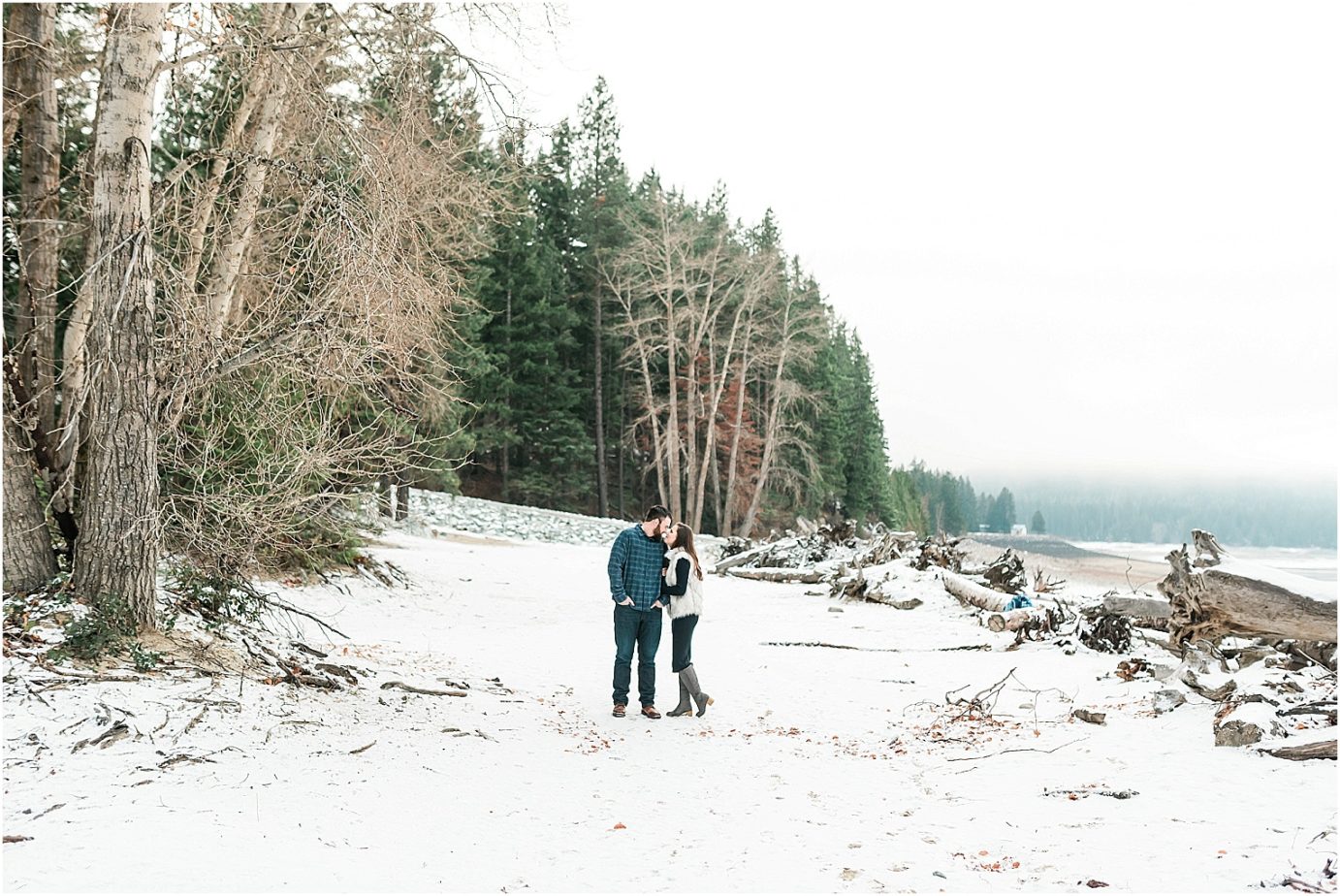 Lake Cle Elum Engagement Session Cle Elum WA Andrew and Stella snuggling by the lake