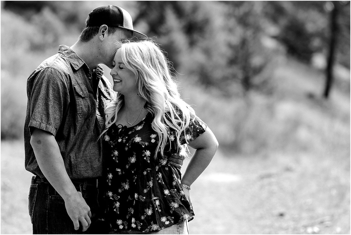 Ellensburg engagement session Ellensburg photographer Clay and Hayley couple hugging in a field