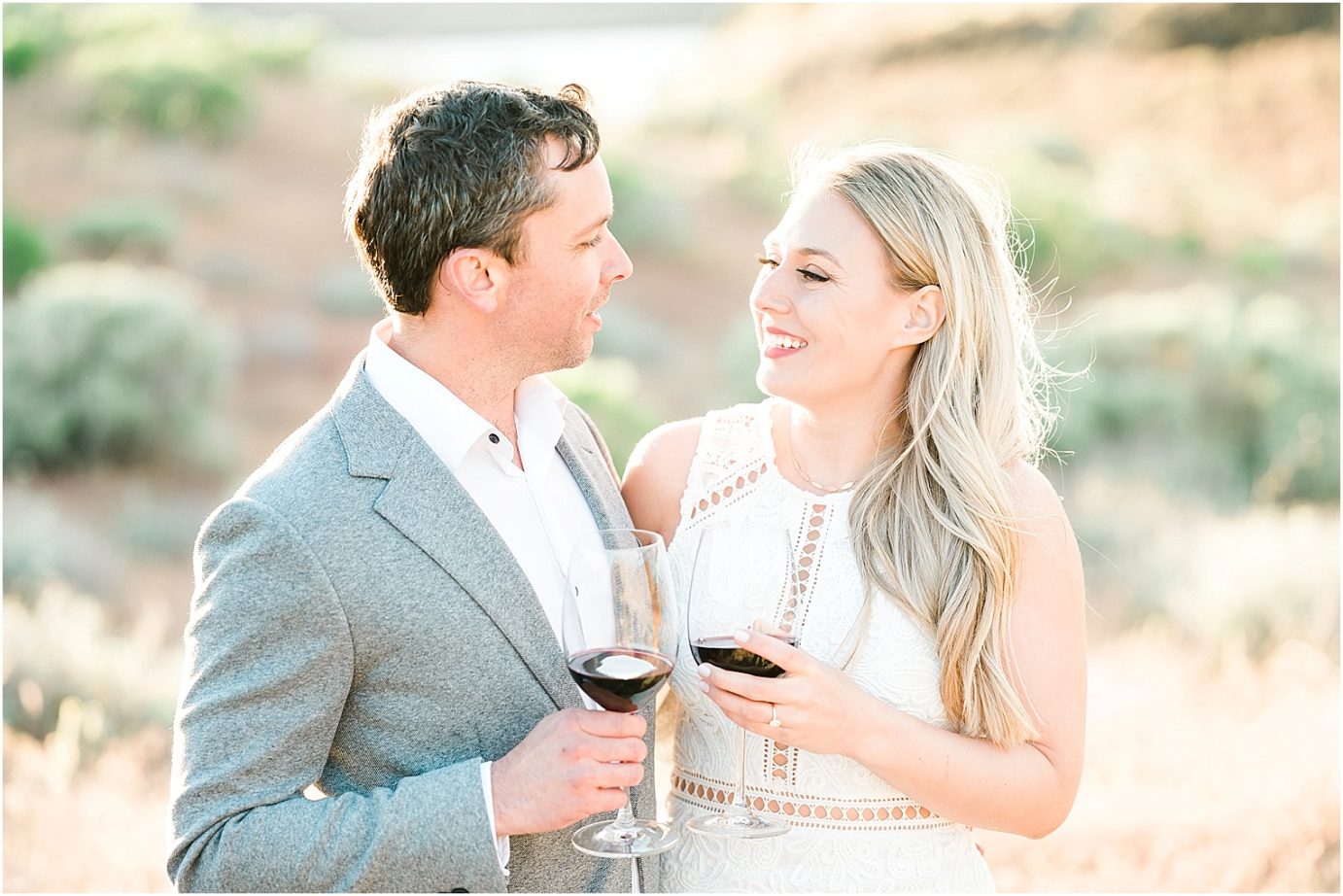 Twin Sisters Engagement Session Tricities photographer Zach and Catherine couple drinking wine together