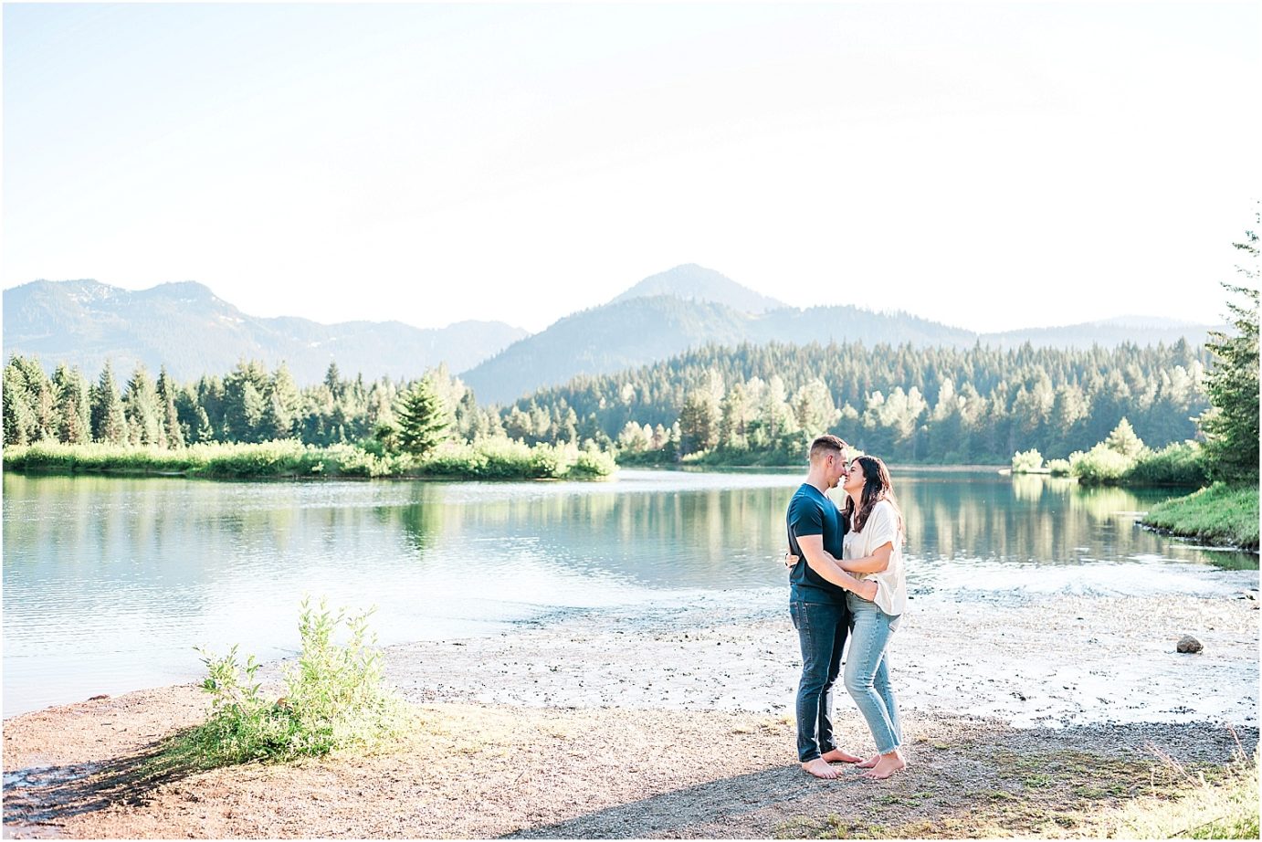 Gold Creek Pond engagement session Jon and Kristen couple standing in the lake