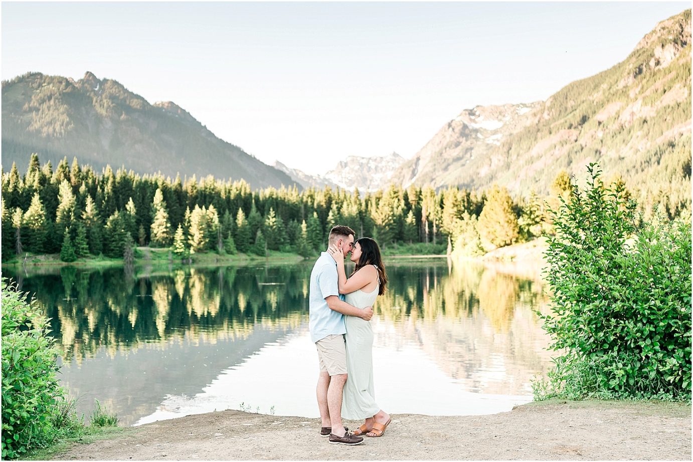 Gold Creek Pond engagement session Jon and Kristen couple standing by the lake