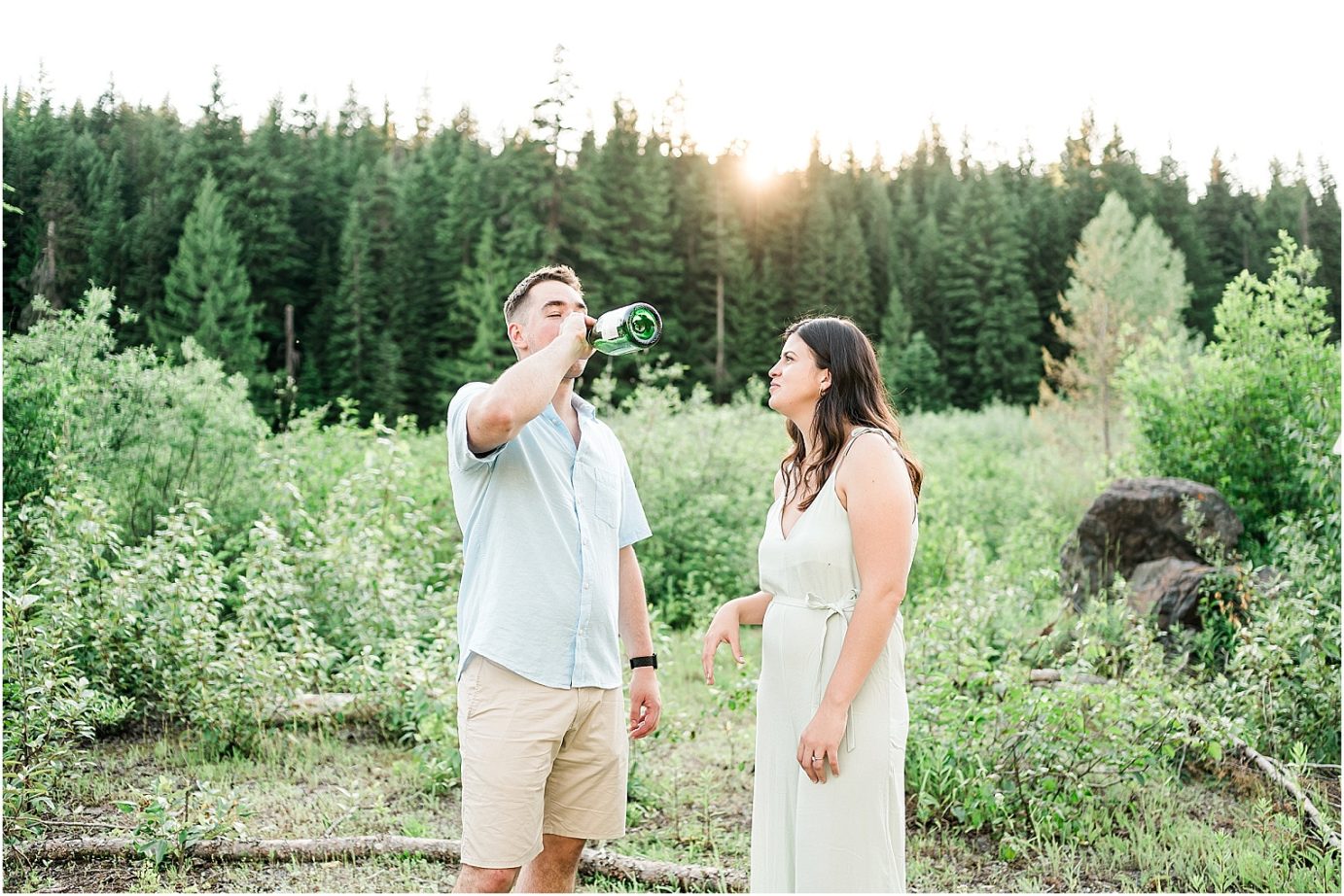 Gold Creek Pond engagement session Jon and Kristen couple popping champagne