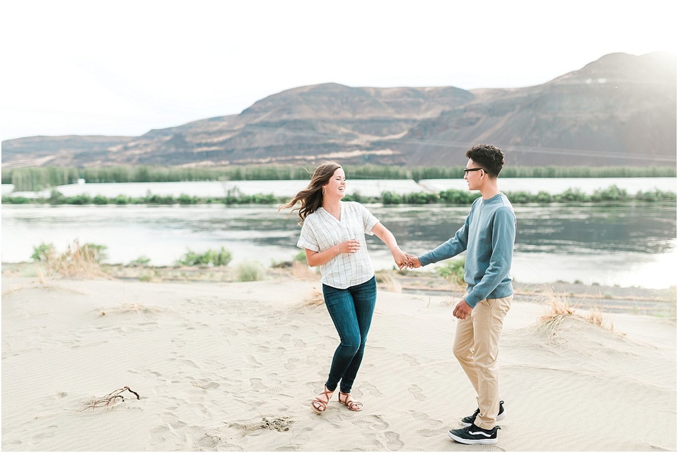 desert engagement session tricities photographer erik and hannah dancing in the sand