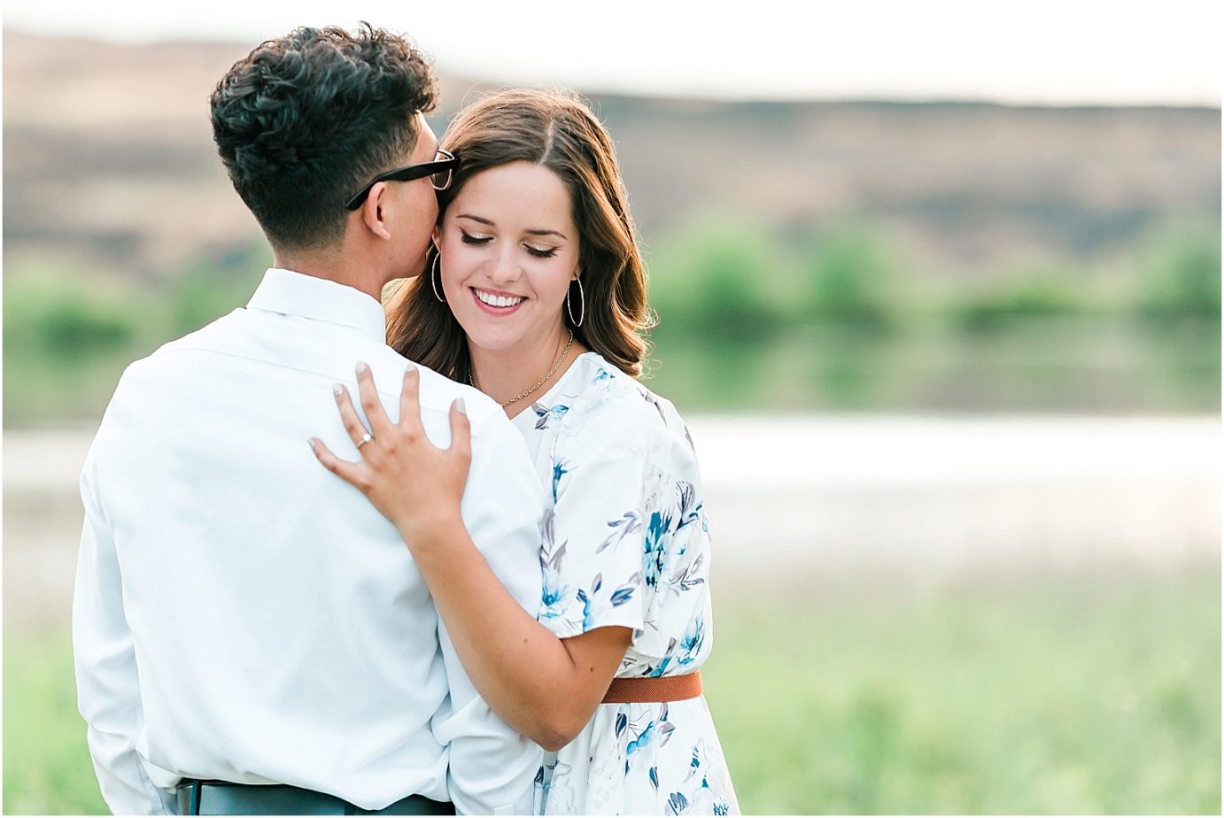 desert engagement session tricities photographer erik and hannah snuggling by the river