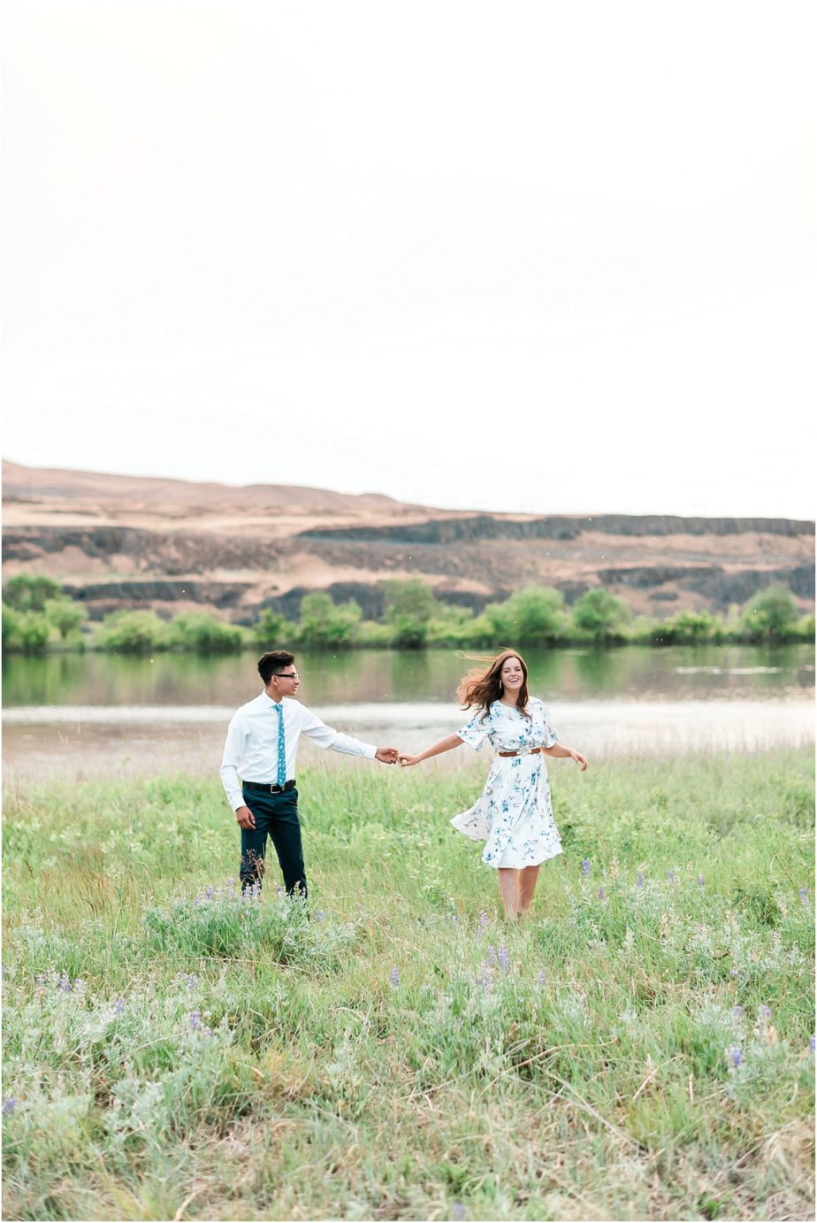 desert engagement session tricities photographer erik and hannah dancing by the river