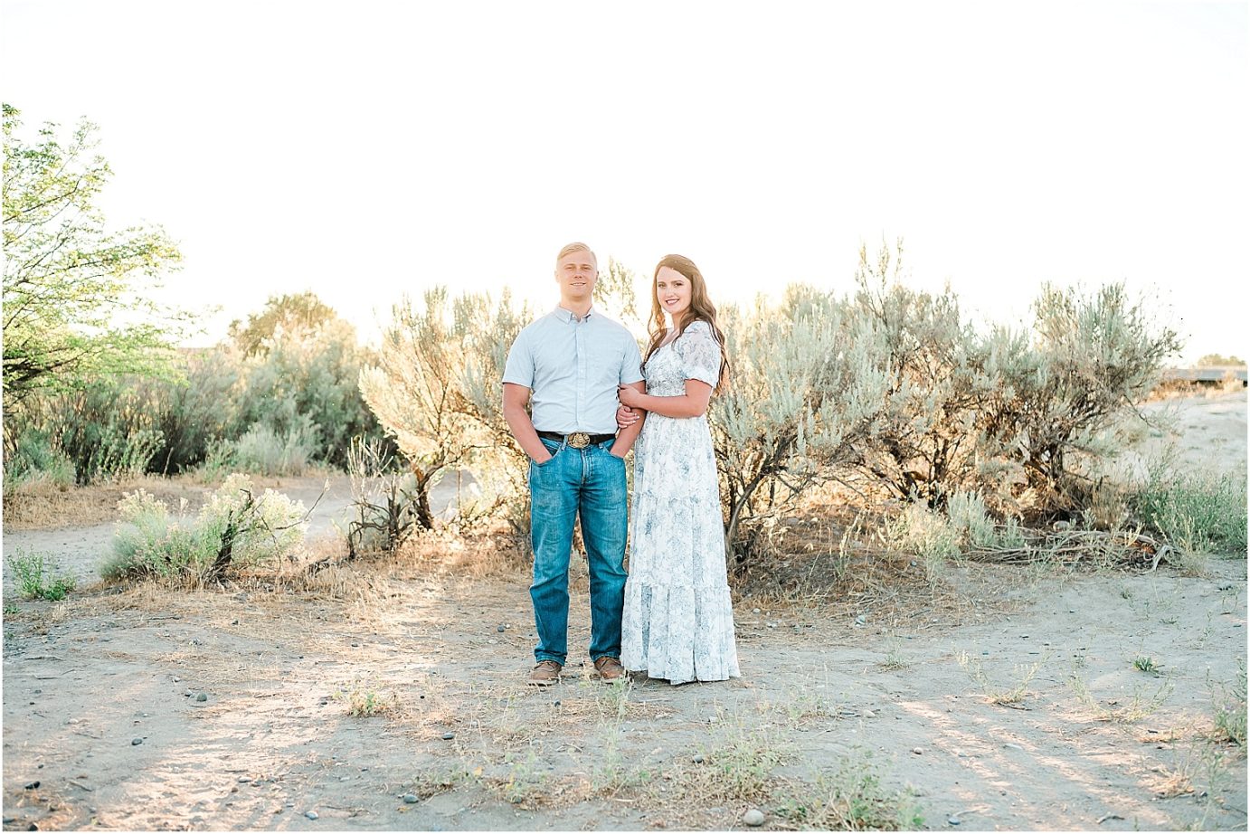 richland engagement session richland photographer Nate and Jacqueline standing in sagebrush