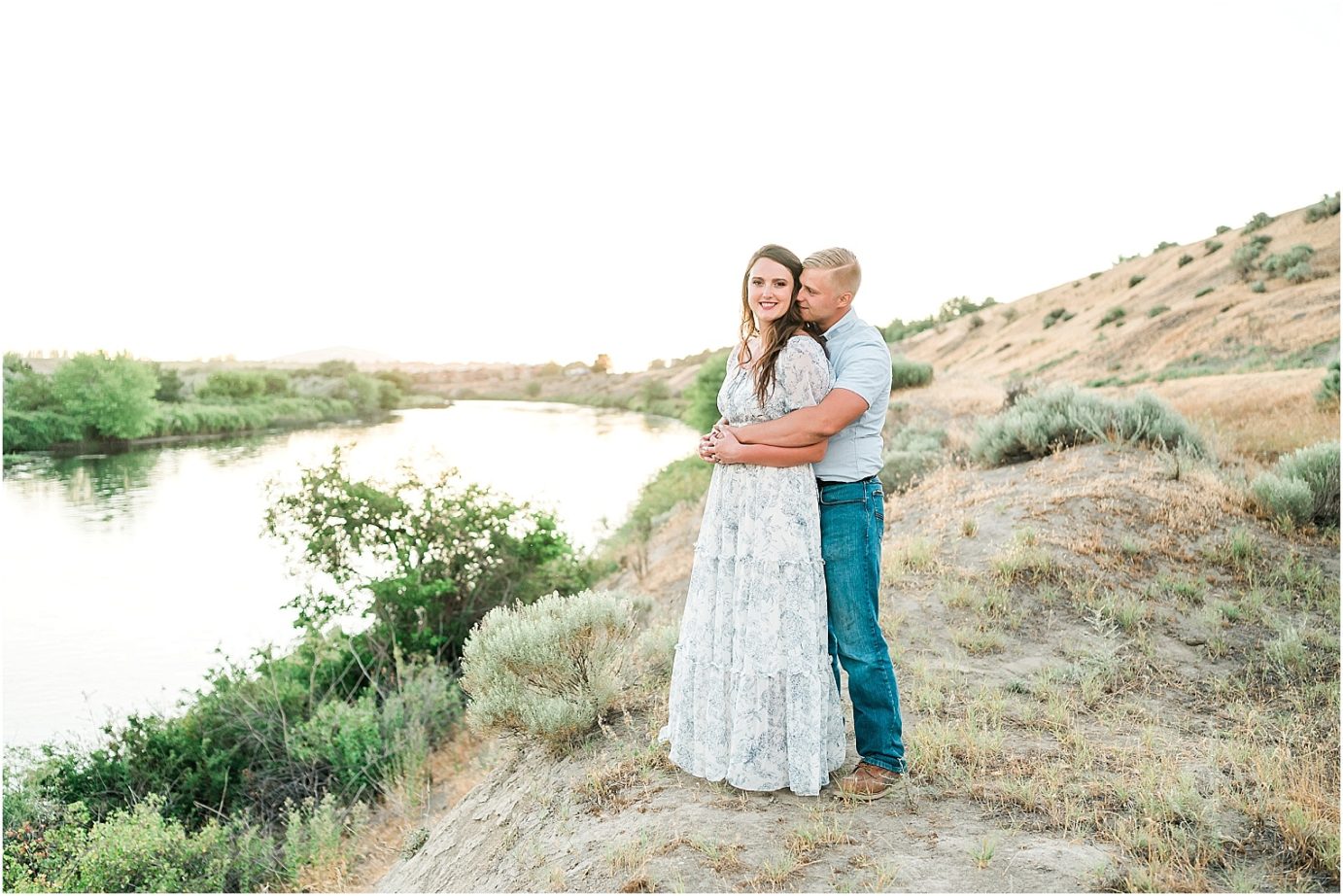 richland engagement session richland photographer Nate and Jacqueline hugging by the river