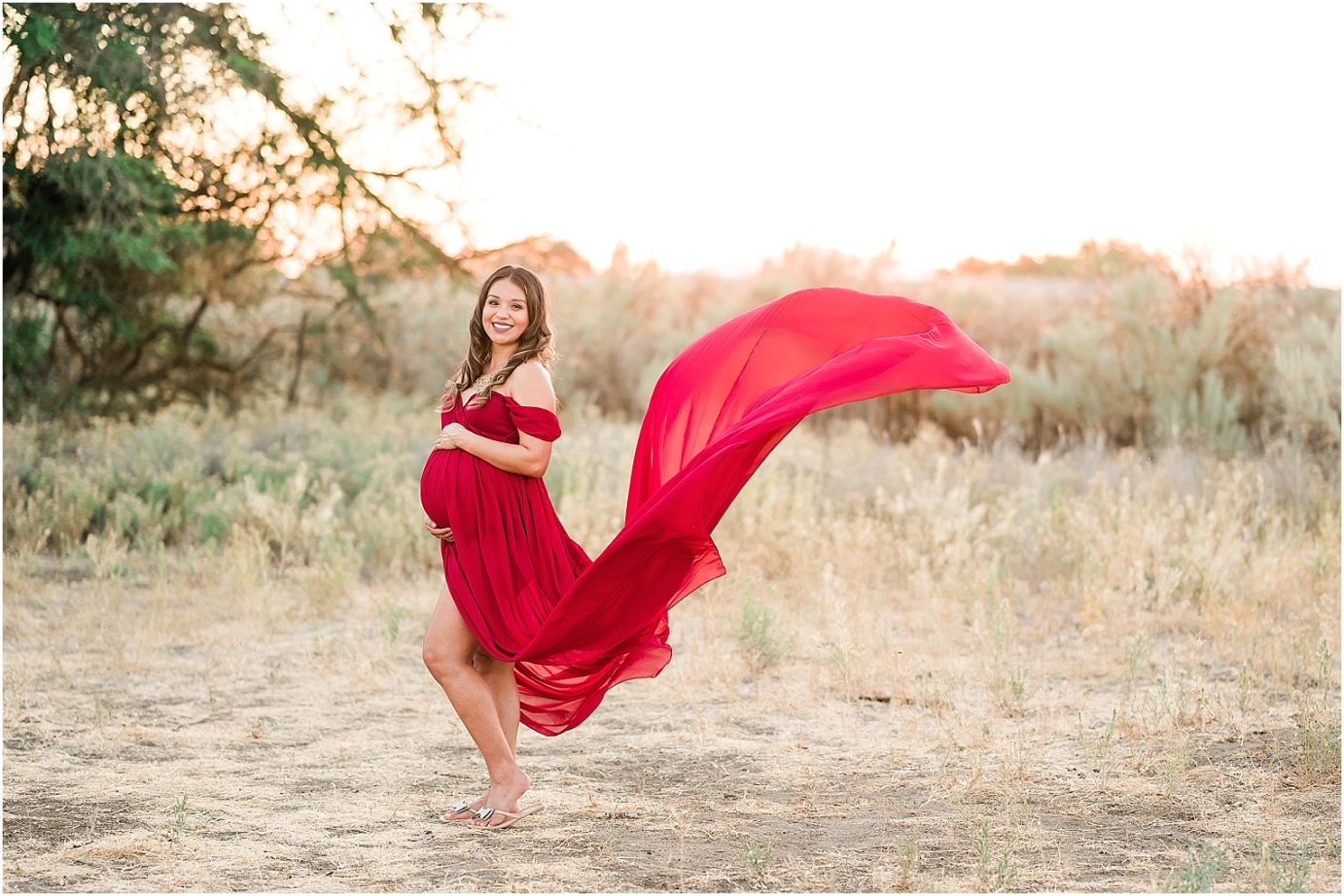 Desert Oasis Maternity Session Baby C pregnant mom in red dress