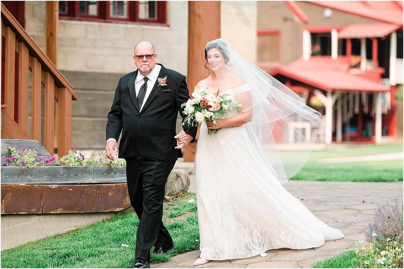 Intimate Pine River Ranch Wedding Leavenworth Photographer Jon and Kristen walking down the aisle with dad