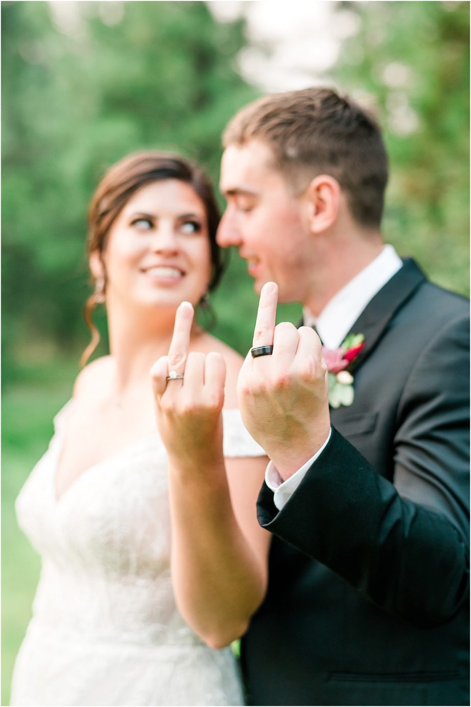 Intimate Pine River Ranch Wedding Leavenworth Photographer Jon and Kristen showing their rings