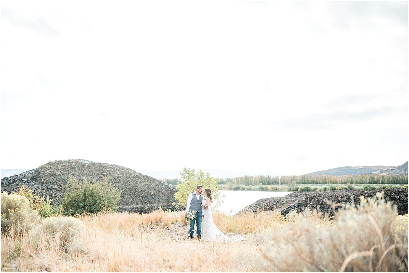 Eastern Washington Elopement Photographer Mike and Carley standing by the river